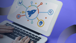 Ilustrasi seseorang mengetik di laptop dengan tampilan ikon roket dan elemen digital, menggambarkan peluncuran dan pengelolaan berkelanjutan sebagai bagian dari proses Maintenance Website.